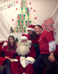 Me (in Santa hat) with my fellow Credit Suisse volunteers and Santa at The Family Center Holiday Open House